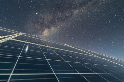 Solar panels against night sky background (stock image). Credit: © abriendomundo / Adobe Stock